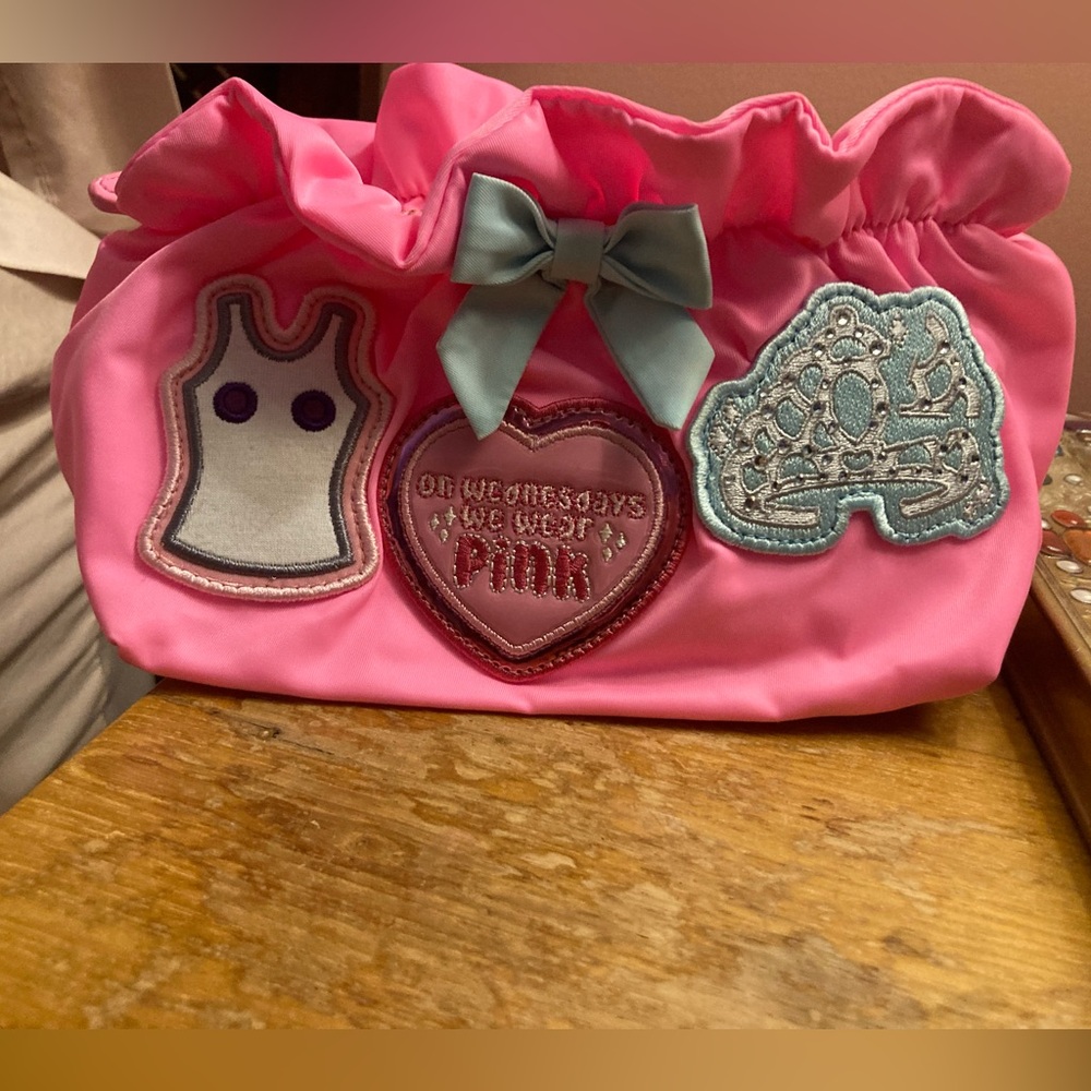 Stoney Clover Lane ‘ Mean Girls’ themed bubblegum and sky bow pouch.